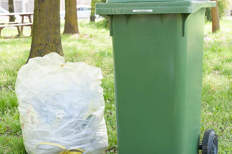 Bag and bin for RFID waste management